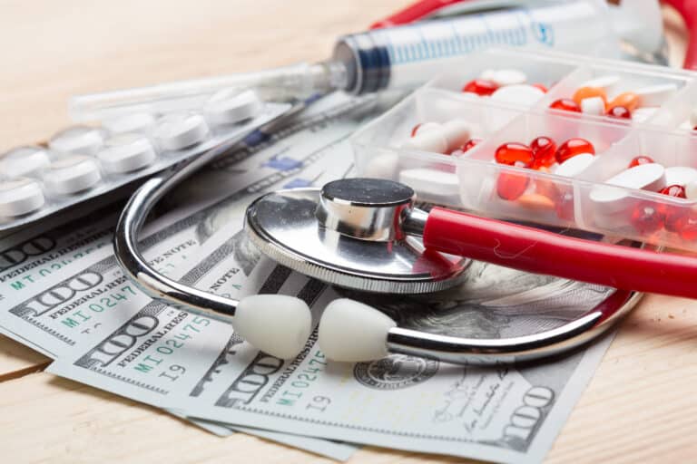 Senior reviewing Medicare Advantage plan changes and monthly healthcare costs